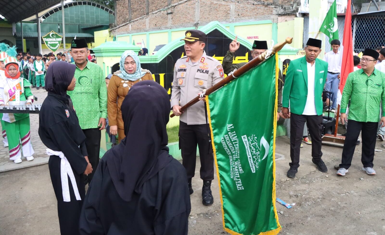 Kapolres Simalungun  Irup Upacara HUT Ke-92 Al-Jamiyatul Washliyah, Sampaikan Pesan Merawat Toleransi Umat Beragama