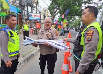 Jelang Hari Idul Fitri 1444 H, Satlantas Polrestabes Medan Bagikan Spanduk
