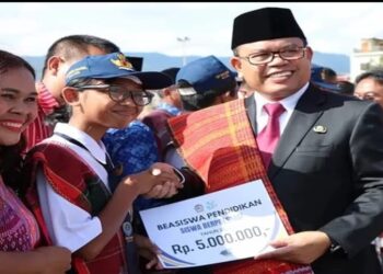 Bupati Poltak Sitorus Minta Peringatan Hari Otda ke-27 Dan Hardiknas Jadi Momentum Peningkatan Kunjungan Wisatawan dan SDM di Kabupaten Toba 