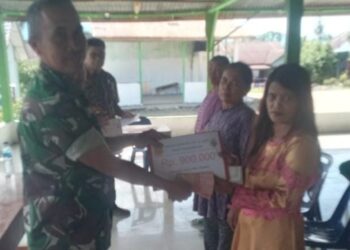 Babinsa Koramil 04/Tigalingga Hadir dan Dampingi Penyaluran BLT-DD Tahap I di Desa Pangaribuan