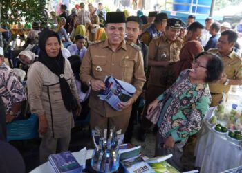 Pj. Bupati Langkat H.M. Faisal Hasrimy Hadiri Expo Pangan Sehat dan Saresehan ke-37 di Desa Kebun Kelapa, Fokus pada Pertanian Berkelanjutan