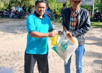 Gandeng Bulog, Pemerintah Kecamatan Sijamapolang Sukses Salurkan 19,6 Ton Beras CPP Gratis ke 982 KPM