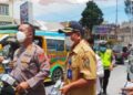Pemkab Karo Bagikan Masker Gratis untuk Warga Terdampak Abu Vulkanik Gunung Sinabung